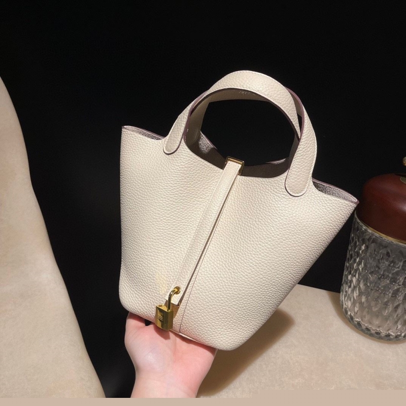 H**mes shopping bags